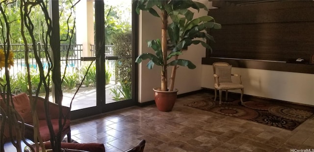 1630 Liholiho St Unit 2205, Honolulu, HI 96822 - doorway to outside featuring stone finish floors