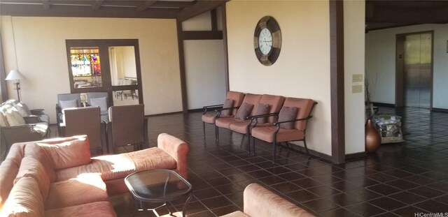 1630 Liholiho St Unit 2205, Honolulu, HI 96822 - living room featuring elevator and beamed ceiling