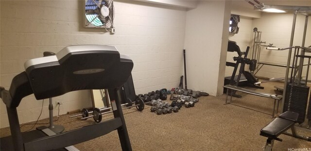 1630 Liholiho St Unit 2205, Honolulu, HI 96822 - workout room featuring carpet flooring and concrete block wall