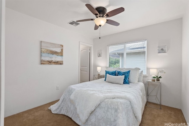 bedroom featuring ceiling fan and carpet floors