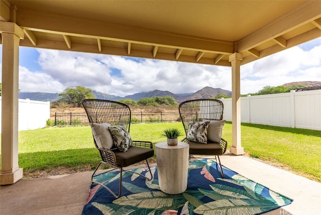 view of patio / terrace with a mountain view