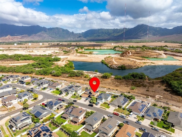 aerial view with a water and mountain view