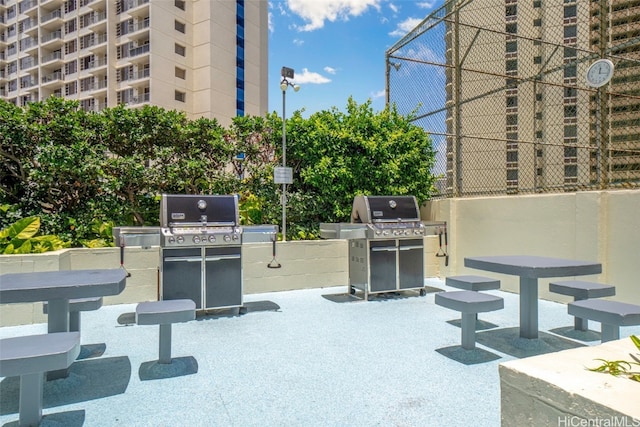 view of property's community featuring an outdoor kitchen