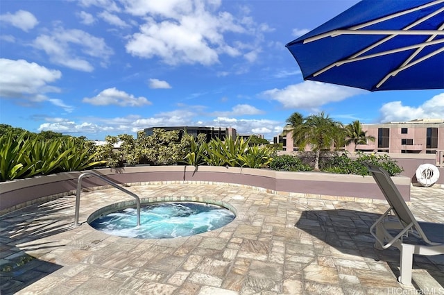 view of pool featuring a patio area and a community hot tub