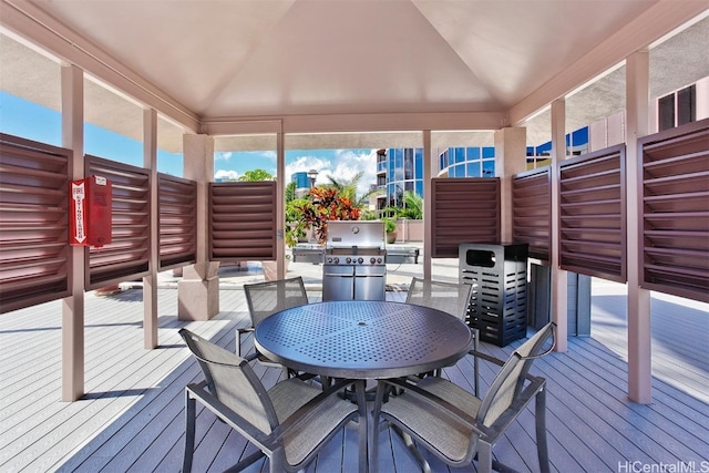 sunroom / solarium with lofted ceiling