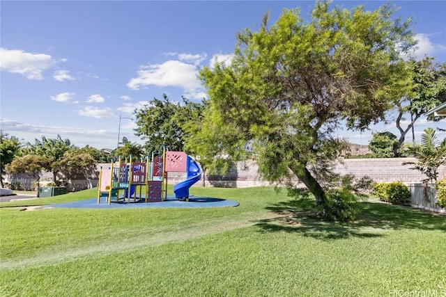 view of playground with a yard