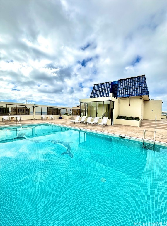 view of pool with a patio area