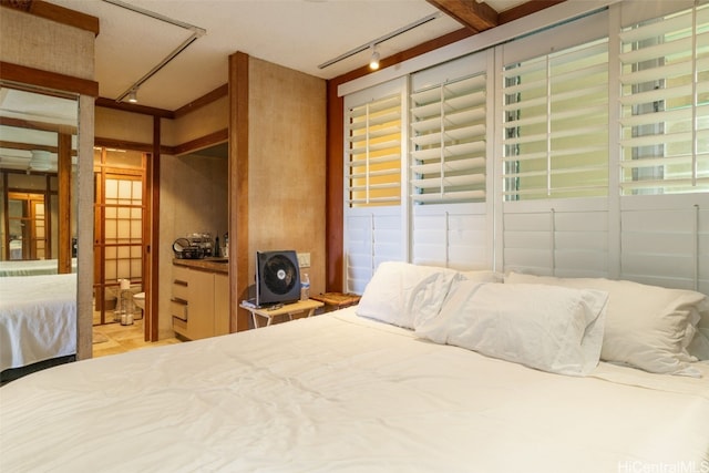 bedroom with rail lighting