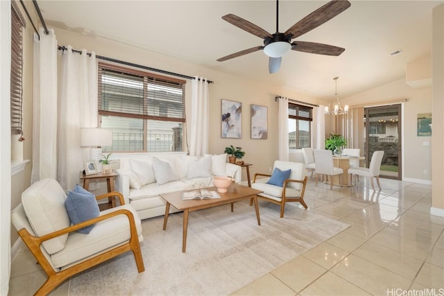 sitting room featuring light tile patterned floors, ceiling fan with notable chandelier, and vaulted ceiling