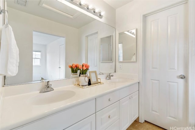 bathroom featuring vanity and tile patterned floors