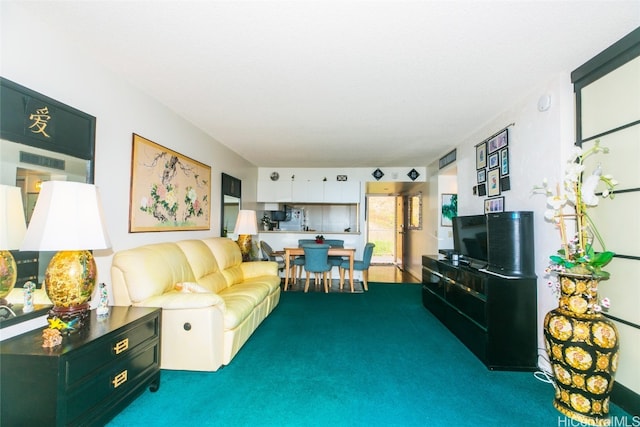 living room featuring dark colored carpet