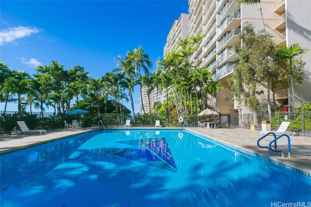 view of swimming pool featuring a patio