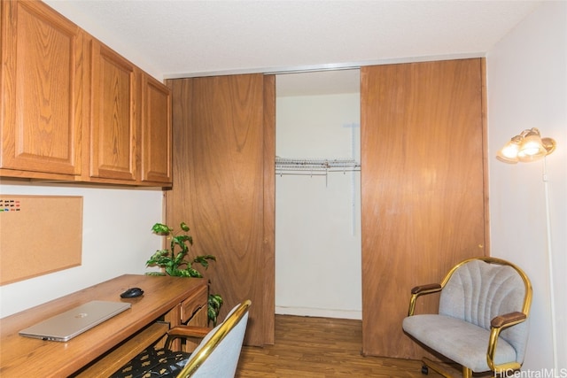 office space with hardwood / wood-style floors