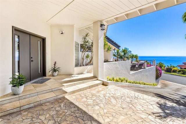 view of patio / terrace featuring a water view