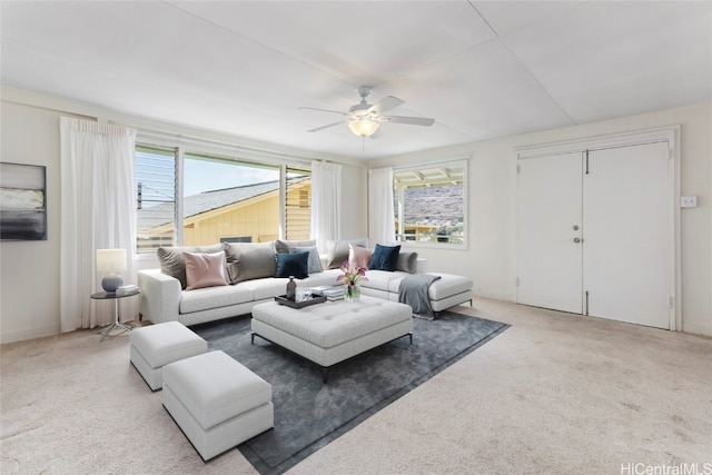 living room with carpet and ceiling fan