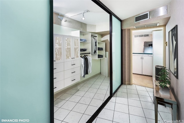 bathroom featuring tile patterned flooring