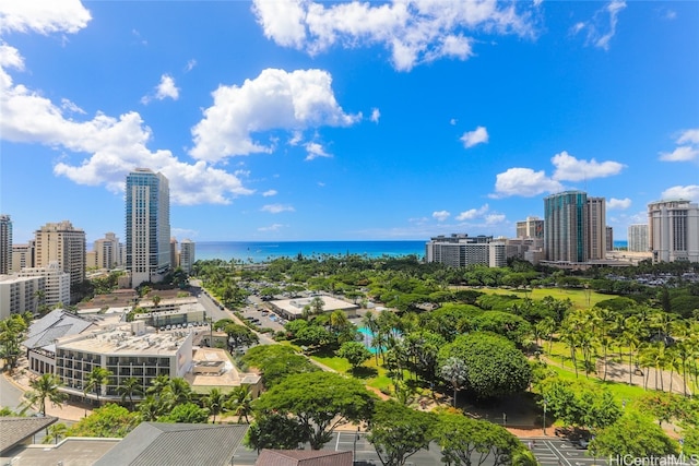 birds eye view of property with a water view