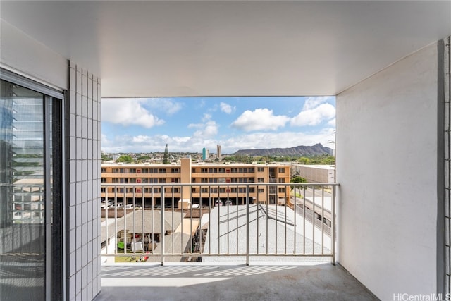 balcony featuring a mountain view