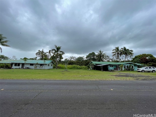 view of front of property with a front lawn