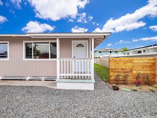 624 Olomana St, Kailua, HI 96734 - view of front of property featuring fence and a porch