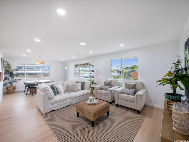624 Olomana St, Kailua, HI 96734 - living room with light wood-type flooring, healthy amount of natural light, and recessed lighting