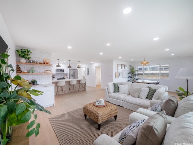 624 Olomana St, Kailua, HI 96734 - living area with light wood finished floors and recessed lighting