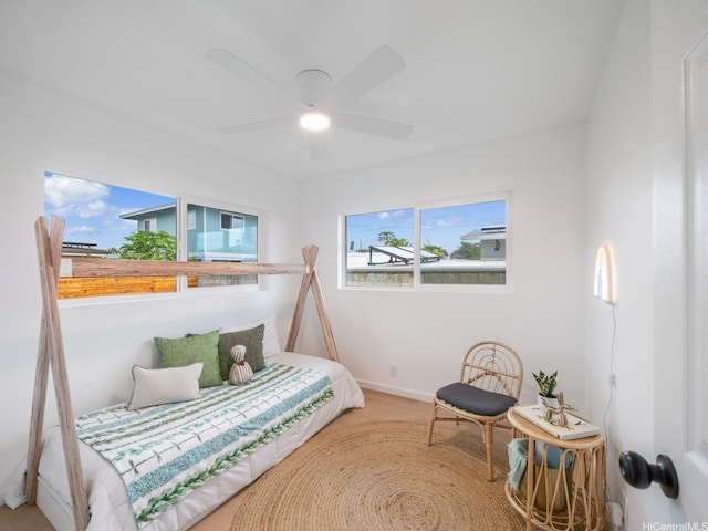 624 Olomana St, Kailua, HI 96734 - bedroom with baseboards, ceiling fan, and wood finished floors