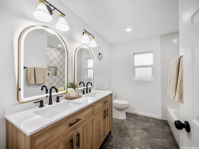 624 Olomana St, Kailua, HI 96734 - bathroom featuring plenty of natural light, baseboards, toilet, double vanity, and recessed lighting
