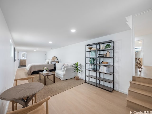 bedroom with light hardwood / wood-style flooring