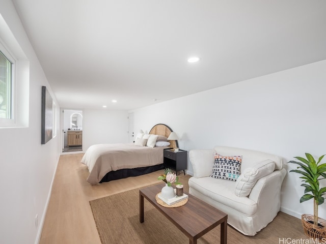 bedroom with light hardwood / wood-style flooring