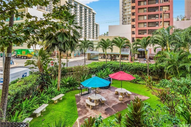 exterior space featuring a lawn and a patio area