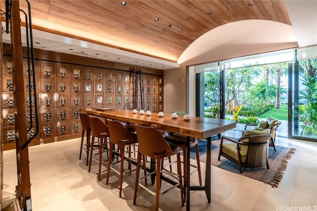 bar with wooden ceiling and vaulted ceiling