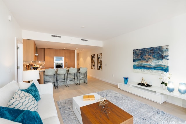 living room featuring light hardwood / wood-style floors