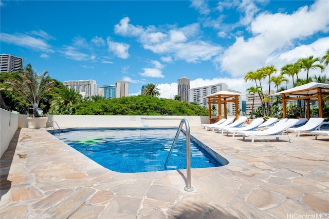 view of pool featuring a gazebo and a patio area