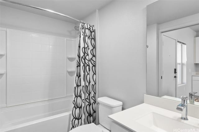 full bathroom with toilet, vanity, and shower / tub combo with curtain