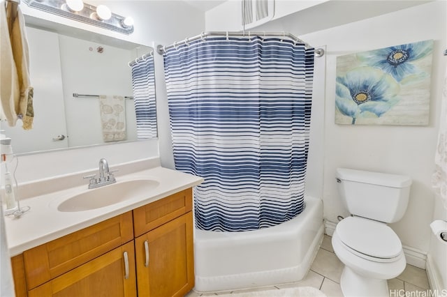 full bathroom with tile patterned floors, vanity, toilet, and shower / tub combo