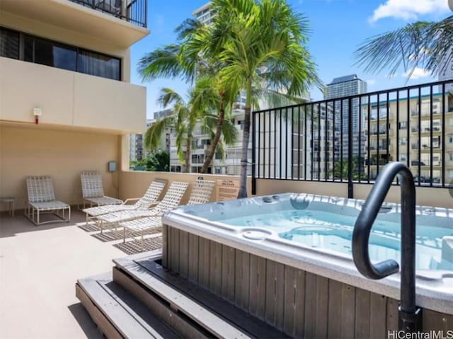 view of patio featuring an outdoor hot tub