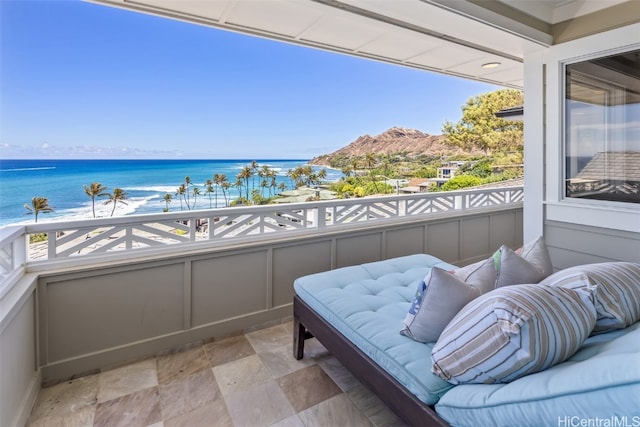 balcony featuring a water view