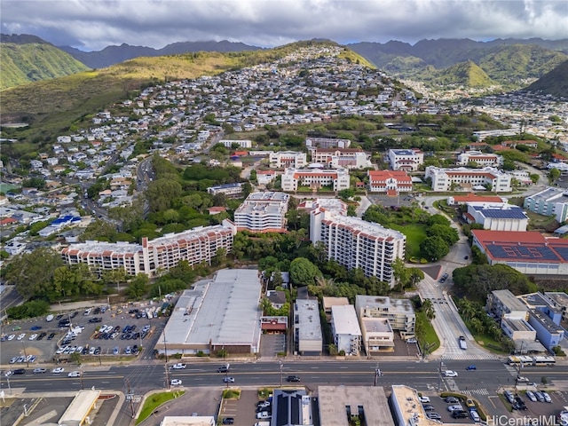 birds eye view of property featuring a mountain view