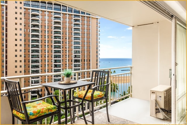 balcony featuring a water view