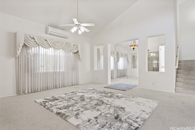 interior space with a wall unit AC, ceiling fan, and high vaulted ceiling