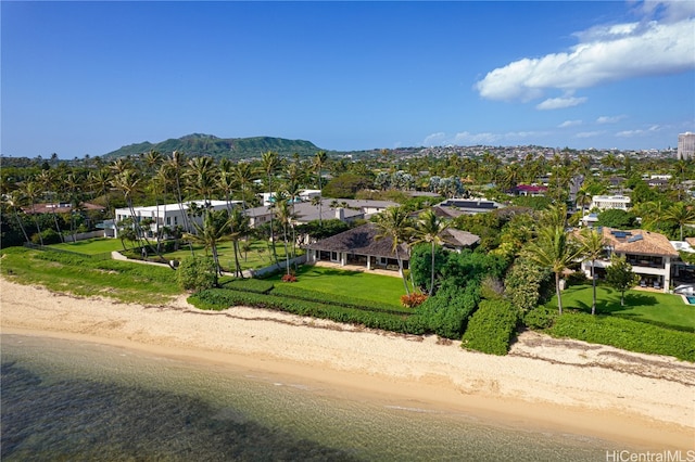 bird's eye view featuring a view of the beach and a water and mountain view