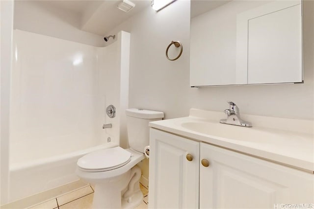 full bathroom featuring toilet, tile patterned flooring, vanity, and washtub / shower combination