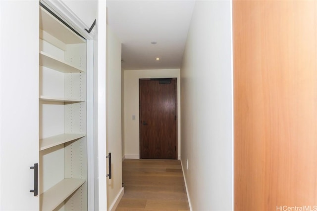 hall featuring light hardwood / wood-style flooring