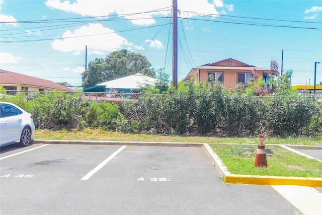 87-118 Helelua St Unit B101, Waianae, HI 96792 - uncovered parking lot with fence