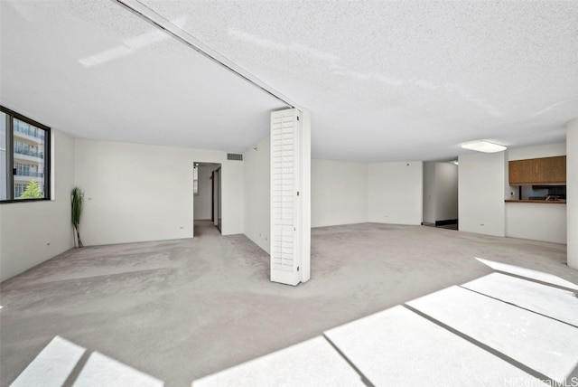 interior space with a textured ceiling