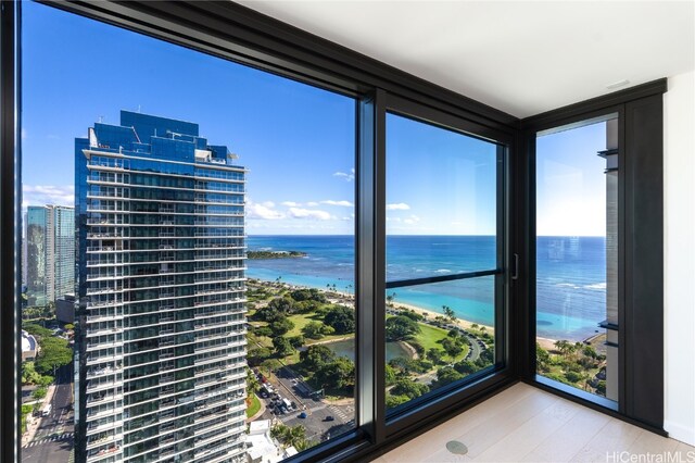 property view of water featuring a beach view