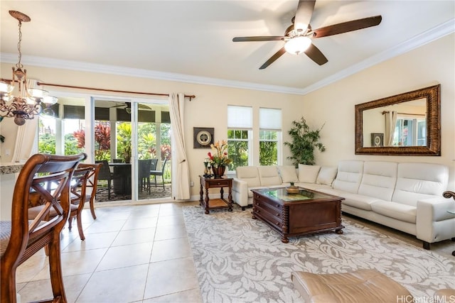 tiled living room featuring ceiling fan with notable chandelier and ornamental molding