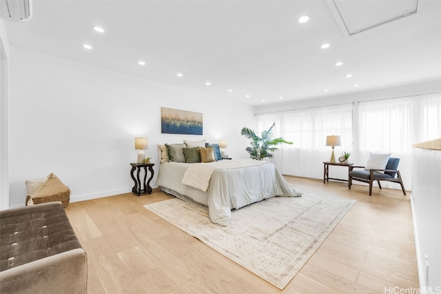 bedroom with light wood-type flooring