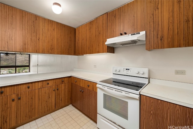 kitchen with white range with electric stovetop